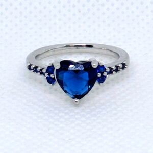 Women's BRAND NEW sparkling Blue CZ Heart Ring in a Size 5. Silver Tone Jewelry
